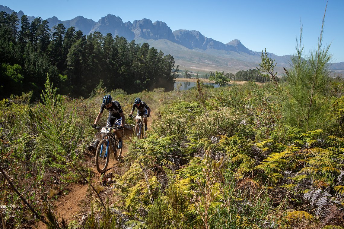 Simon Schneller and Urs Huber of Team Bulls during stage 1 of the 2022 Absa Cape Epic Mountain Bike stage race from Lourensford Wine Estate to Lourensford Wine Estate, South Africa on the 21st March 2022. Photo by Nick Muzik/Cape Epic
PLEASE ENSURE T