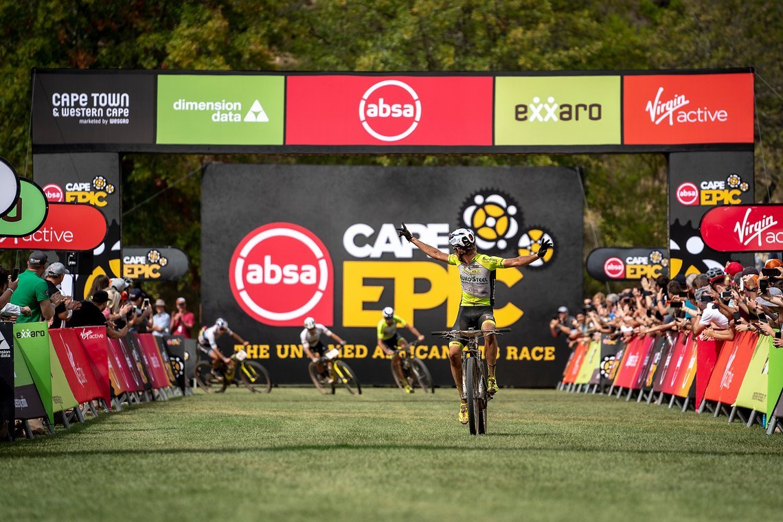 Matthys Beukes of Pyga Eurosteel crosses the line first to win the stage during stage 5 of the 2019 Absa Cape Epic Mountain Bike stage race held from Oak Valley Estate in Elgin to the University of Stellenbosch Sports Fields in Stellenbosch, South Af
