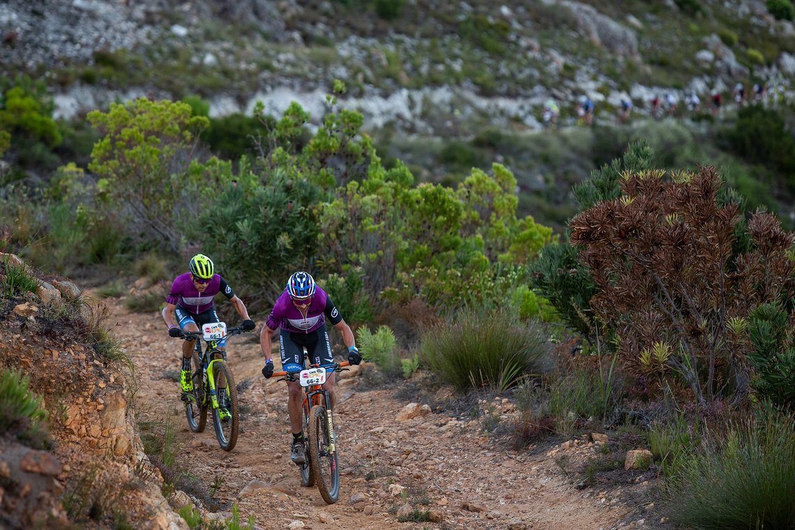 Bart Brentjens and Abraao Azevedo during stage 5 of the 2019 Absa Cape Epic Mountain Bike stage race held from Oak Valley Estate in Elgin to the University of Stellenbosch Sports Fields in Stellenbosch, South Africa on the 22nd March 2019.

Photo b