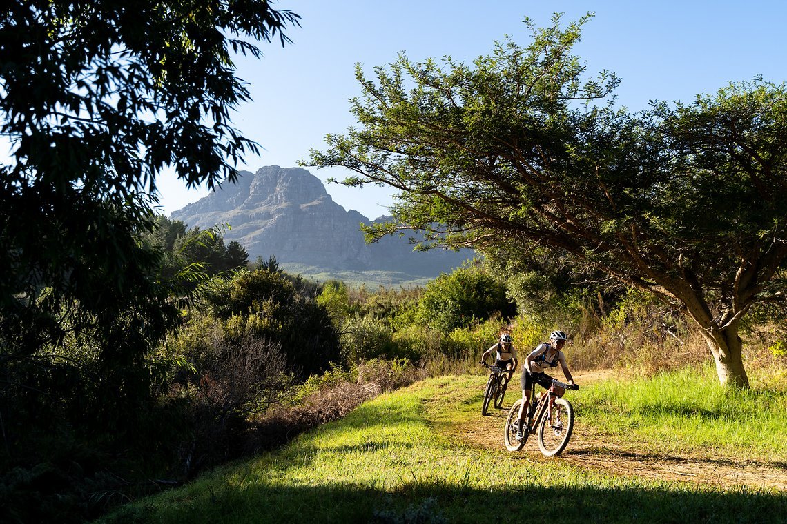 Gina Ricardo and Imogen Smith of team Wilson Asset Management during stage 1 of the 2022 Absa Cape Epic Mountain Bike stage race from Lourensford Wine Estate to Lourensford Wine Estate, South Africa on the 21st March 2022.