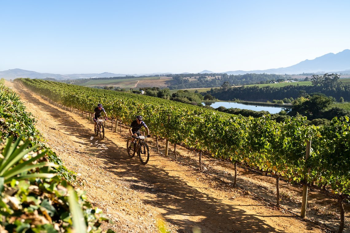 Norbert Cavegn and Ronny Cavegn of team MidFunder-Scott Riders during stage 1 of the 2022 Absa Cape Epic Mountain Bike stage race from Lourensford Wine Estate to Lourensford Wine Estate, South Africa on the 21st March 2022.