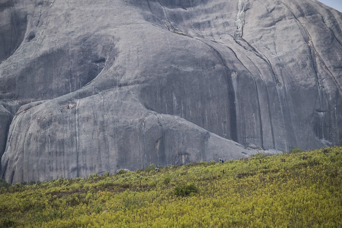 Riders with Paarl Rock in background during Stage 4 of the 2025 Absa Cape Epic Mountain Bike stage race held at Fairview, Paarl, Cape Town, South Africa on the 20th March 2025. Photo by Dom Barnardt/Cape Epic
PLEASE ENSURE THE APPROPRIATE CREDIT IS G