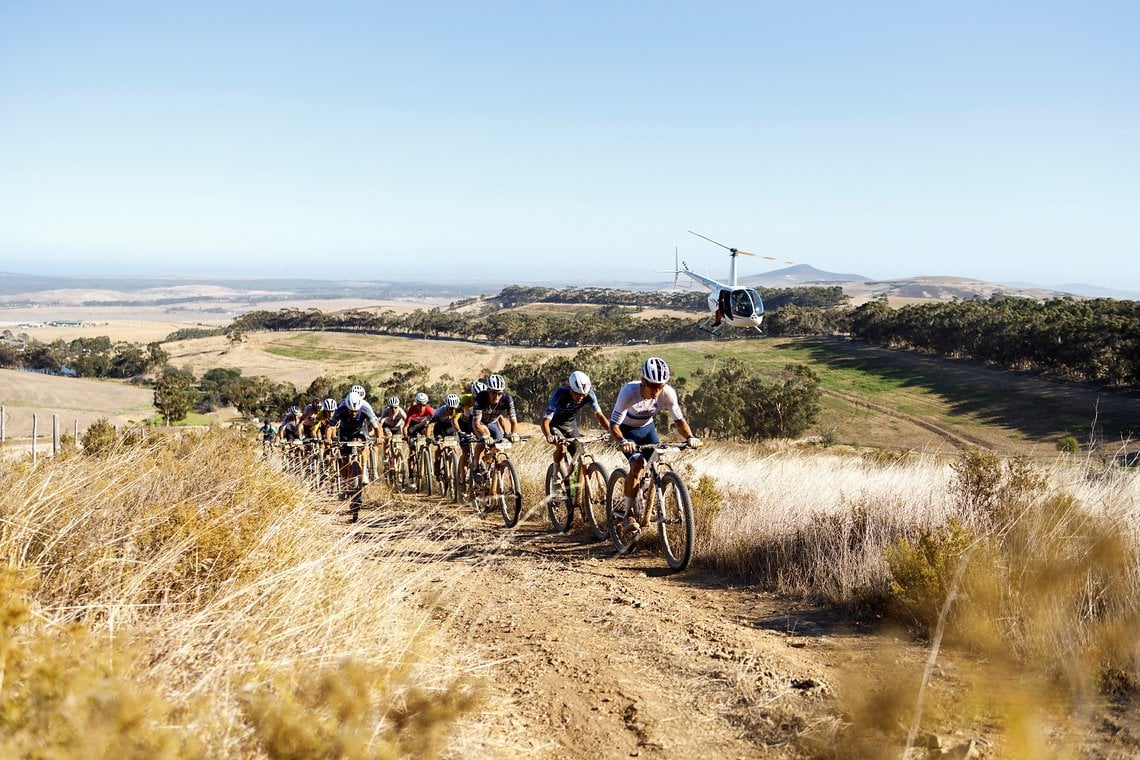The leading bunch during Stage 1 of the 2025 Absa Cape Epic Mountain Bike stage race held at Meerendal Wine Estate, Cape Town, South Africa on the 17th March 2025. Photo by Nick Muzik/Cape Epic
PLEASE ENSURE THE APPROPRIATE CREDIT IS GIVEN TO THE PHO