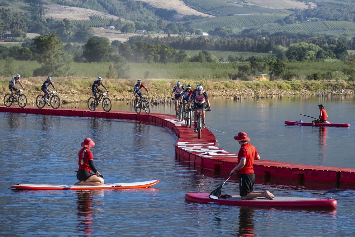 Riders head over the Thirsti bridge during Stage 1 of the 2024 Absa Cape Epic Mountain Bike stage race from Saronsberg Wine Estate to Saronsberg Wine Estate, Tulbagh, South Africa on the 18th March 2024. Photo by Dominic Barnardt / Cape Epic
PLEASE E