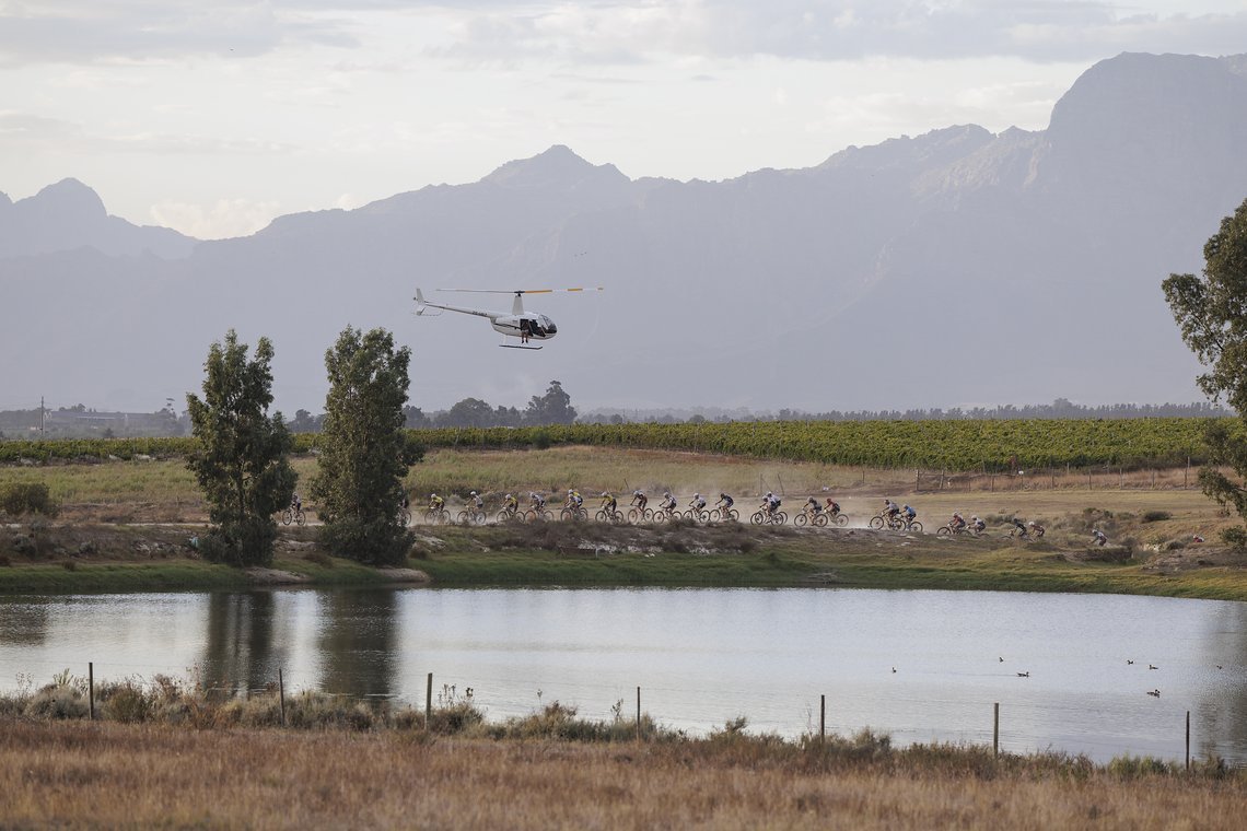 The leading bunch during Stage 4 of the 2025 Absa Cape Epic Mountain Bike stage race held at Fairview, Paarl, Cape Town, South Africa on the 20th March 2025. Photo by Nick Muzik/Cape Epic
PLEASE ENSURE THE APPROPRIATE CREDIT IS GIVEN TO THE PHOTOGRAP