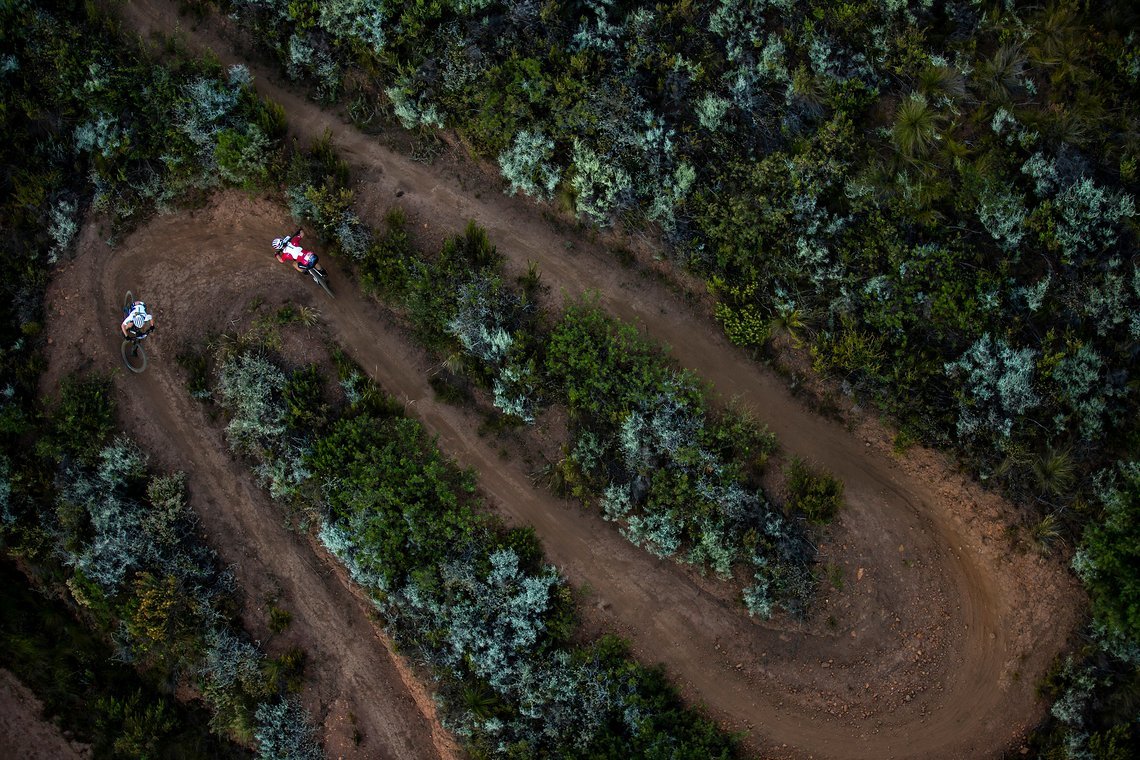 Amy Wakefield and Ariane Luthi of Symbtech ZA descend Helderberg trails during stage 1 of the 2022 Absa Cape Epic Mountain Bike stage race from Lourensford Wine Estate to Lourensford Wine Estate, South Africa on the 21st March 2022. Photo by Gary Per
