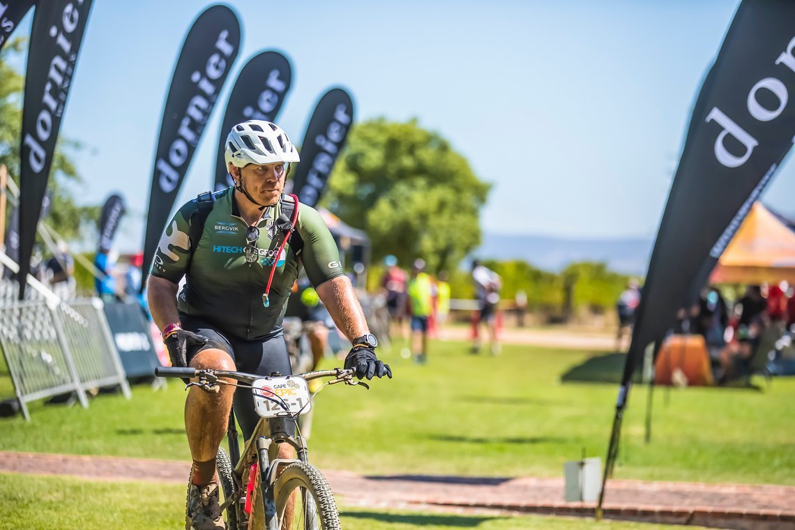 John Smit during stage 1 of the 2022 Absa Cape Epic Mountain Bike stage race from Lourensford Wine Estate to Lourensford Wine Estate, South Africa on the 21st March 2022. © Dom Barnardt / Cape Epic