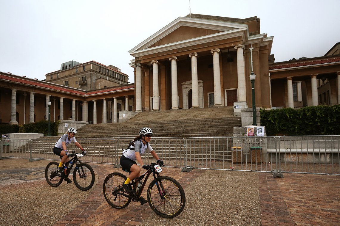 Magdalena Mihura and Elisa Gali pass Jameson Memorial Hall at UCT during the Prologue of the 2019 Absa Cape Epic Mountain Bike stage race held at the University of Cape Town in Cape Town, South Africa on the 17th March 2019.

Photo by Shaun Roy/Cap