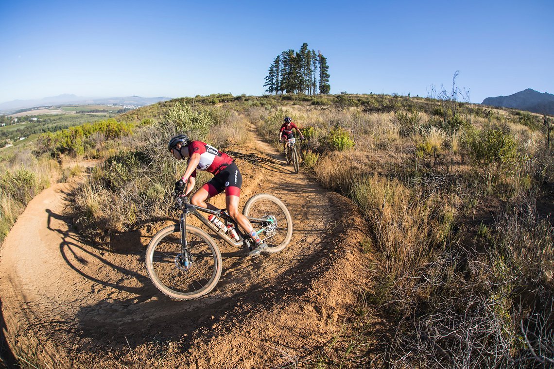 Candice Lill and Mariske Strauss during stage 1 of the 2022 Absa Cape Epic Mountain Bike stage race from Lourensford Wine Estate to Lourensford Wine Estate, South Africa on the 21st March 2022. © Dom Barnardt / Cape Epic