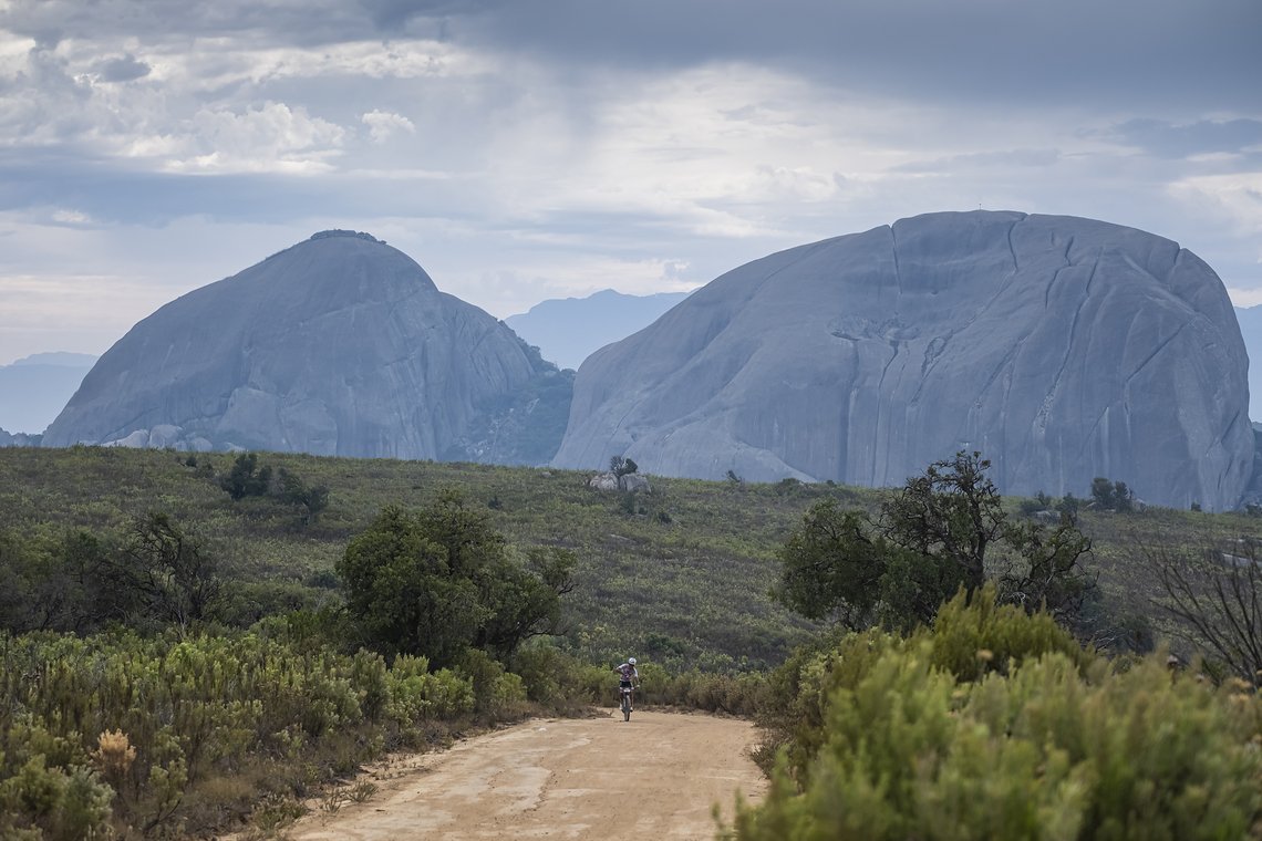 Lone rider heads up a climb with Paarl rock in the background during Stage 4 of the 2025 Absa Cape Epic Mountain Bike stage race held at Fairview, Paarl, Cape Town, South Africa on the 20th March 2025. Photo by Dom Barnardt/Cape Epic
PLEASE ENSURE TH