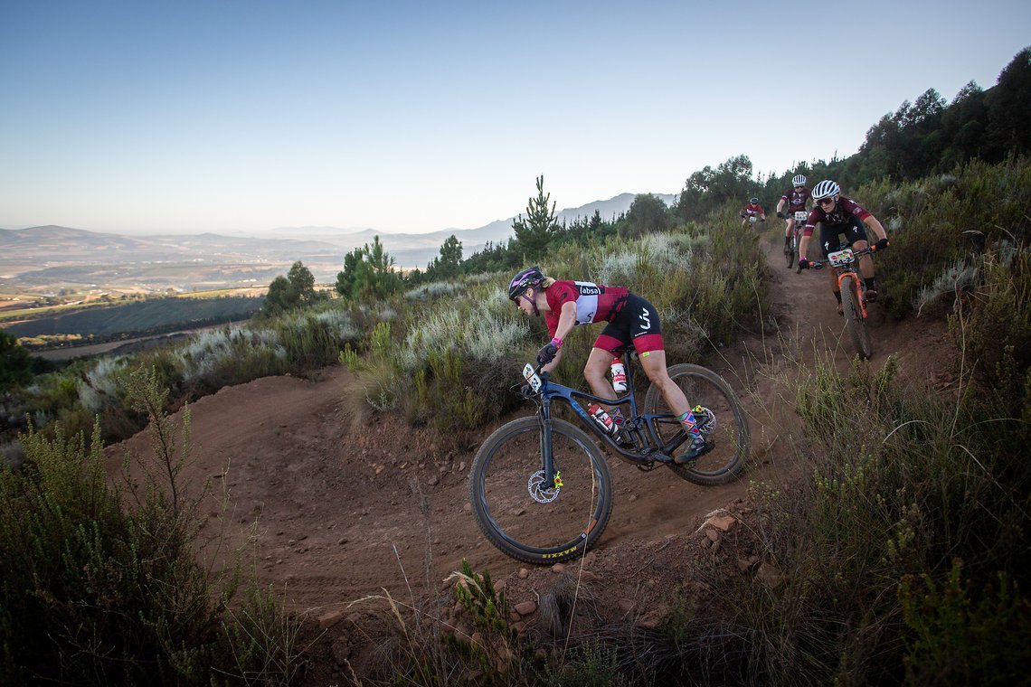 Mariske Strauss of Faces Rola leads the ladies down Heldeberg Trails during stage 1 of the 2022 Absa Cape Epic Mountain Bike stage race from Lourensford Wine Estate to Lourensford Wine Estate, South Africa on the 21st March 2022. Photo by Nick Muzik/