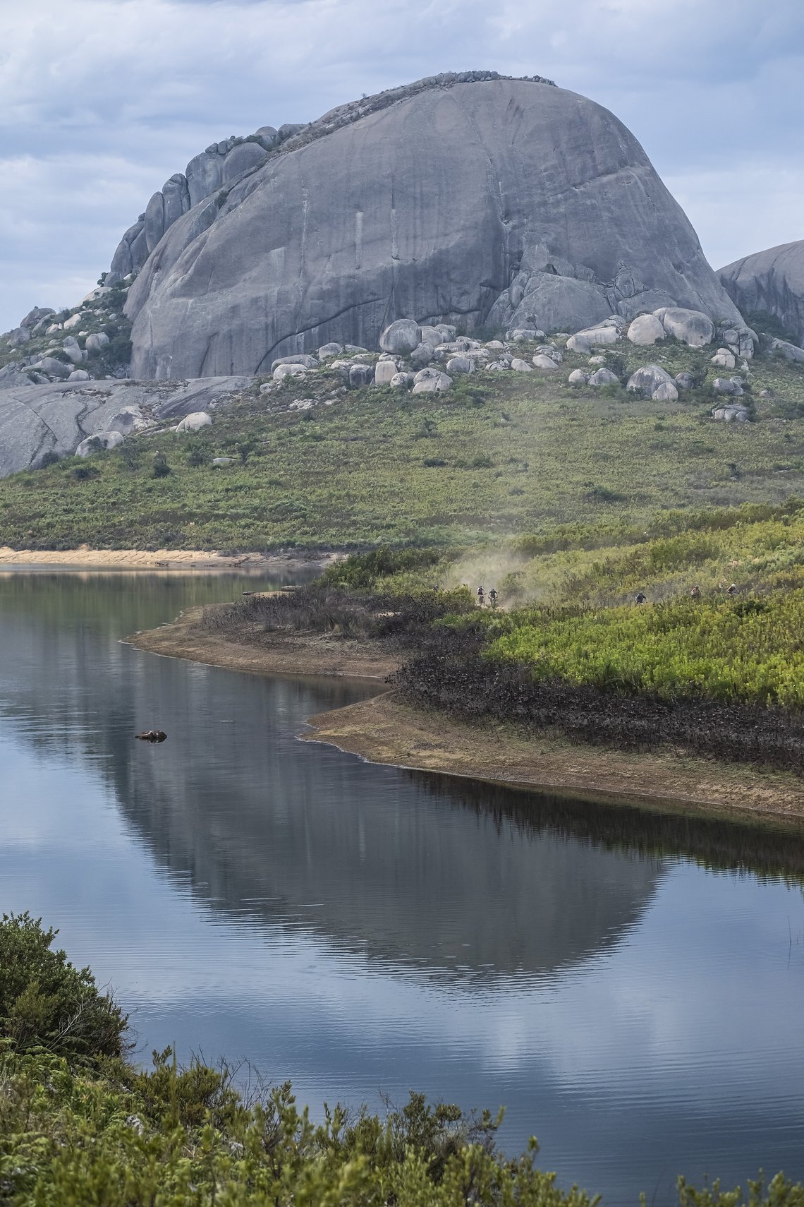 Riders with Paarl Rock in background during Stage 4 of the 2025 Absa Cape Epic Mountain Bike stage race held at Fairview, Paarl, Cape Town, South Africa on the 20th March 2025. Photo by Dom Barnardt/Cape Epic
PLEASE ENSURE THE APPROPRIATE CREDIT IS G