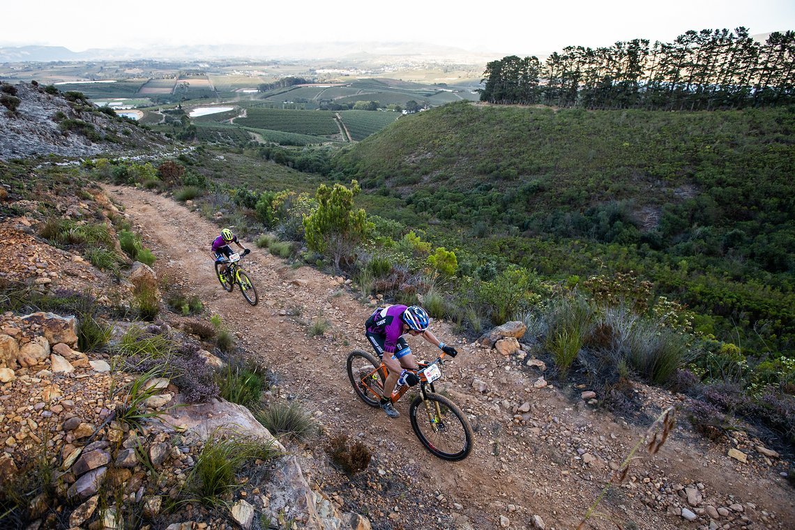 Bart Brentjens and Abraao Azevedo during stage 5 of the 2019 Absa Cape Epic Mountain Bike stage race held from Oak Valley Estate in Elgin to the University of Stellenbosch Sports Fields in Stellenbosch, South Africa on the 22nd March 2019.

Photo b