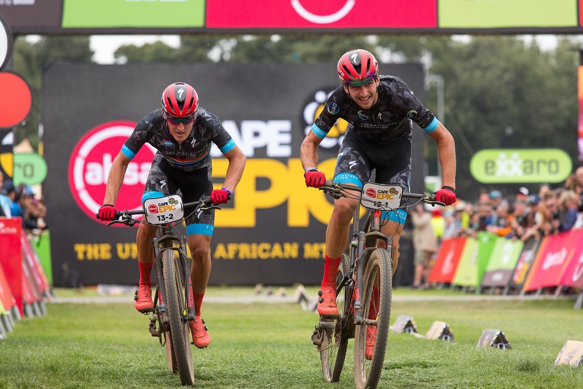 Alan Hatherly & Matthew Beers of Specialized Foundation NAD cross the line (Beers with a flat rear tyre) of the 2019 Absa Cape Epic Mountain Bike stage race held at the University of Cape Town in Cape Town, South Africa on the 17th March 2019.

Pho