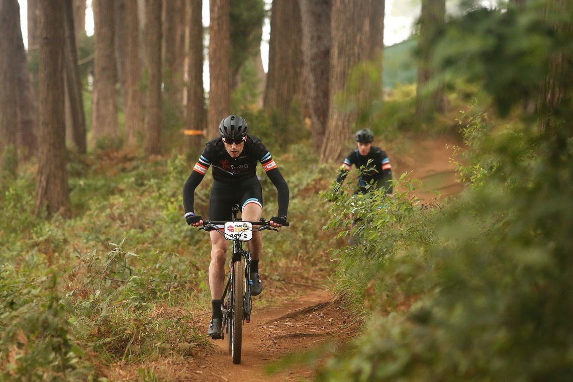 Bram Lambert and Bruno Vanhecke work their way along the trail during the Prologue of the 2019 Absa Cape Epic Mountain Bike stage race held at the University of Cape Town in Cape Town, South Africa on the 17th March 2019.

Photo by Shaun Roy/Cape E