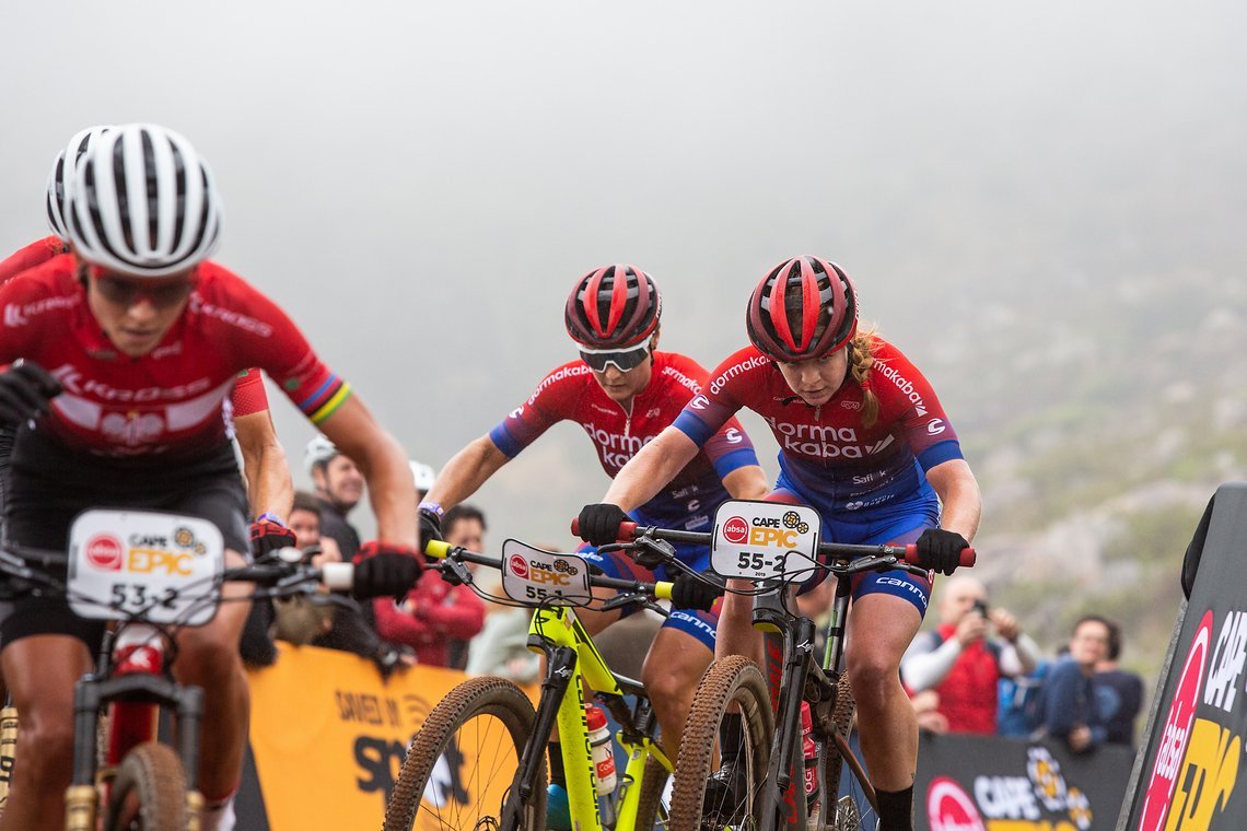 Amy Mcdougall (R) and Samantha Sanders (Middle) during the Prologue of the 2019 Absa Cape Epic Mountain Bike stage race held at the University of Cape Town in Cape Town, South Africa on the 17th March 2019.

Photo by Sam Clark/Cape Epic

PLEASE E