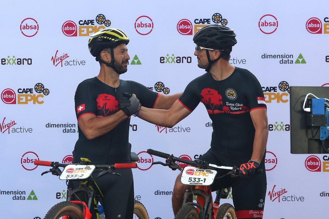 Steve Knabl and Thibaud Grizard of the BarBarians wish each other before setting off during the Prologue of the 2019 Absa Cape Epic Mountain Bike stage race held at the University of Cape Town in Cape Town, South Africa on the 17th March 2019.

Pho