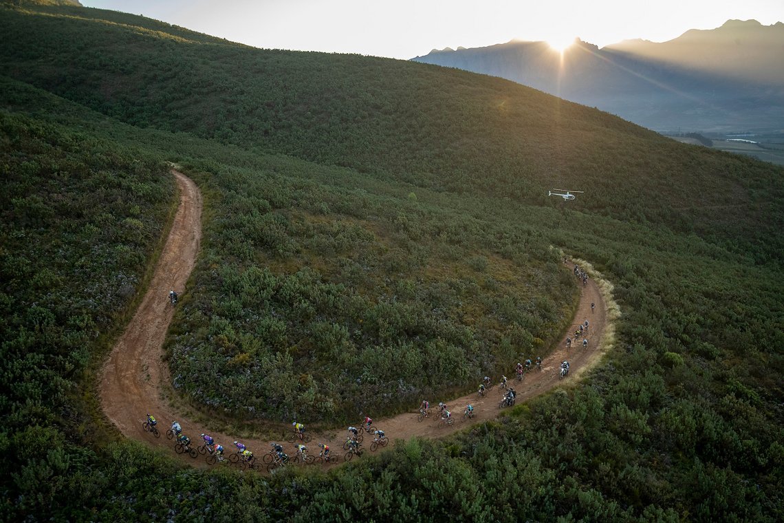 The Mens fields climbs Helderberg Nature Reserve during stage 1 of the 2022 Absa Cape Epic Mountain Bike stage race from Lourensford Wine Estate to Lourensford Wine Estate, South Africa on the 21st March 2022. Photo by Gary Perkin