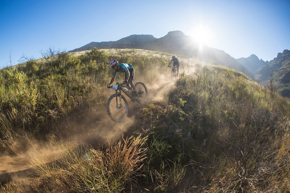 Sergio Gutierrez and Francesc Carretero during stage 1 of the 2022 Absa Cape Epic Mountain Bike stage race from Lourensford Wine Estate to Lourensford Wine Estate, South Africa on the 21st March 2022. © Dom Barnardt / Cape Epic