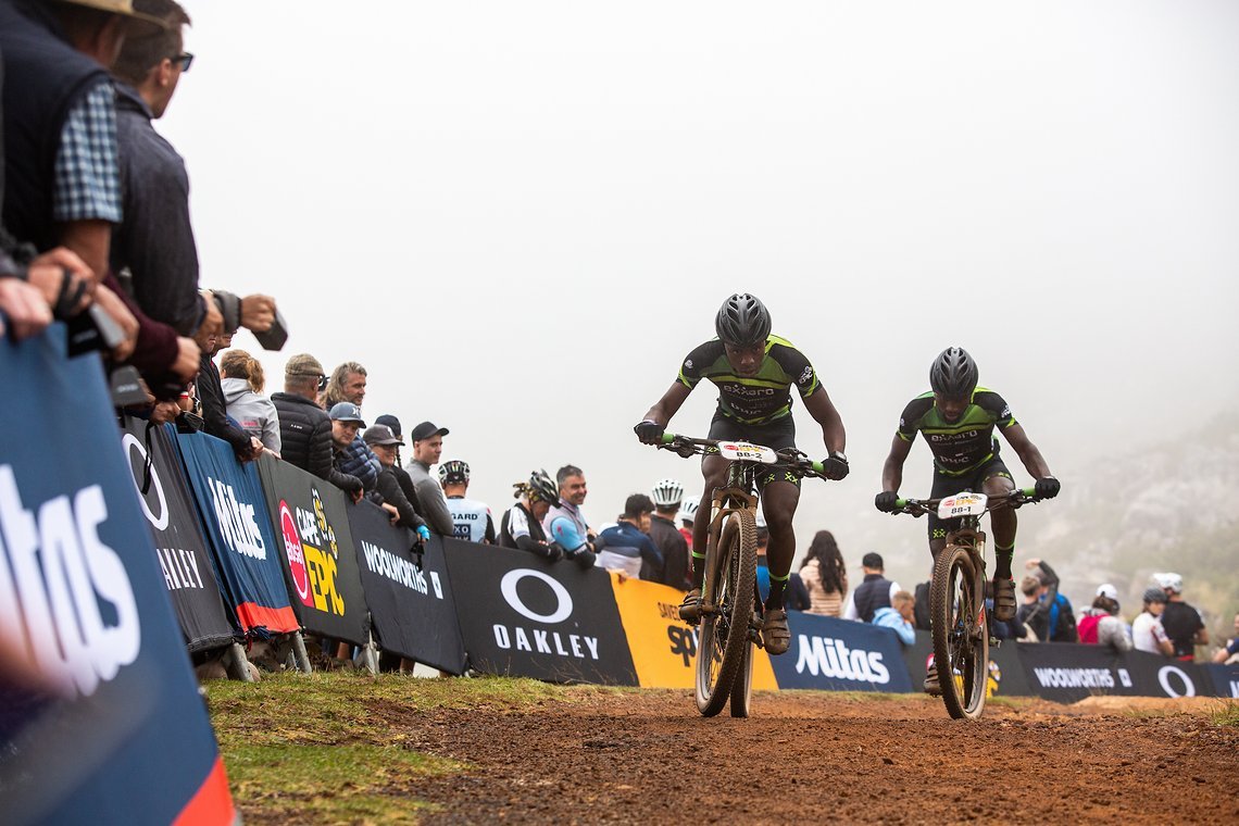 Patrick Rengane (L) andKagiso Tlou (R) during the Prologue of the 2019 Absa Cape Epic Mountain Bike stage race held at the University of Cape Town in Cape Town, South Africa on the 17th March 2019.

Photo by Sam Clark/Cape Epic

PLEASE ENSURE THE