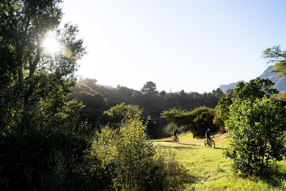 Two riders during stage 1 of the 2022 Absa Cape Epic Mountain Bike stage race from Lourensford Wine Estate to Lourensford Wine Estate, South Africa on the 21st March 2022.