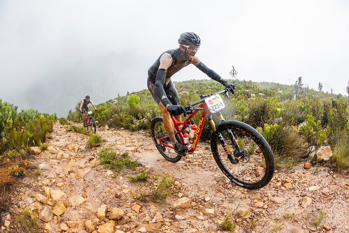 Oliver Munnik and Rogan Smart during stage 6 of the 2023 Absa Cape Epic Mountain Bike stage race from Lourensford Wine Estate to Lourensford Wine Estate in Somerset West, South Africa on the 25 th March 2023. Photo Sam Clark