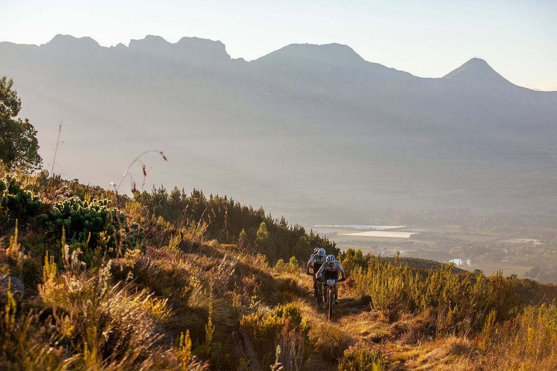 Ibon Zugasti and  Anton Sintsov during stage 1 of the 2022 Absa Cape Epic Mountain Bike stage race from Lourensford Wine
Estate to Lourensford Wine Estate, South Africa on the 21st March 2022. Photo Sam Clark/Cape Epic