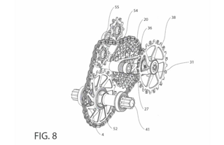 Das Patent umfasst zwei Versionen. In der ersten Version lässt sich die Kassette (20) axial auf der Abtriebswelle verschieben. Das Patent umfasst zwei Versionen. In der ersten Version lässt sich die Kassette (20) axial auf der Abtriebswelle verschieben.