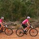 Deon Kruger and Fred Buter of Humankind Grand Masters wear the Pink Jersey in support of Joel Stransky&#039;s LumoHawk Foundation work their way along the route during stage 3 of the 2019 Absa Cape Epic Mountain Bike stage race held from Oak Valley Estate