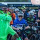 Riders enjoy the Exxaro mascot including Christoph Sauser during stage 6 of the 2022 Absa Cape Epic Mountain Bike stage race from Stellenbosch to Stellenbosch, South Africa on the 26th March 2022.