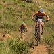 The leading elite ladies Haley Batten and Sofia Villafane take the win during stage 6 of the 2022 Absa Cape Epic Mountain Bike stage race from Stellenbosch to Stellenbosch, South Africa on the 26th March 2022.