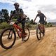 Nic Dlamini and Oli Munnik of team ABSA Amawele during stage 5 of the 2022 Absa Cape Epic Mountain Bike stage race from Elandskloof in Greyton to Stellenbosch, South Africa on the 25th March 2022.