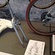 Speedmaster brake drawing and type ll racing fork at museum display
