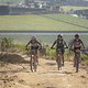Vera Looser and Alexis Skarda followed by Jessi on the media E-bike during Stage 3 of the 2025 Absa Cape Epic Mountain Bike stage race held at Fairview, Paarl, Cape Town, South Africa on the 19th March 2025. Photo by Dom Barnardt/Cape Epic
PLEASE ENS