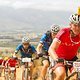 Mark Pieterse mit einer Gruppe Mitfahrer an einem Aufstieg - Greg Beadle-Cape Epic-SPORTZPICS