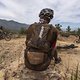 Burt Gildenhuys watches riders pass as he waits for medics to arrive after hurting his shoulder during Stage 1 of the 2024 Absa Cape Epic Mountain Bike stage race from Saronsberg Wine Estate to Saronsberg Wine Estate, Tulbagh, South Africa on the 18t