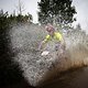 Rider creates big splash riding through water during stage 3 of the 2019 Absa Cape Epic Mountain Bike stage race held from Oak Valley Estate in Elgin, South Africa on the 20th March 2019.

Photo by Xavier Briel/Cape Epic

PLEASE ENSURE THE APPROP