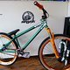 NS Bikes Suburban Park Grün orange mit Rock Shox RCT orange Hope Naben etc Bild 1