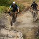 Riders go through a puddle during Stage 6 of the 2024 Absa Cape Epic Mountain Bike stage race from Stellenbosch to Stellenbosch, South Africa on 23 March 2024. Photo by Dom Barnardt / Cape Epic
PLEASE ENSURE THE APPROPRIATE CREDIT IS GIVEN TO THE PHO
