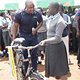 Bicycle handover Charles and girl student 2