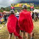 Riders wait with blankets for other finishers in really tough conditions due to consistent rain and heavy mud during stage 6 of the 2023 Absa Cape Epic Mountain Bike stage race held at Lourensford Wine Estate in Somerset West South Africa on the 25th