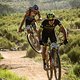 David Nordemann and Shaun-Nick Bester hitting some jumps in Jonkershoek during the final stage (stage 7) of the 2019 Absa Cape Epic Mountain Bike stage race from the University of Stellenbosch Sports Fields in Stellenbosch to Val de Vie Estate in Paa