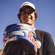 Carson Storch receives a new helmet at Red Bull Rampage in Virgin, Utah on October 24, 2018