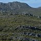 Vor diesem Hintergrund wirken die Fahrer winzig - Foto von Kelvin Trautman-Cape Epic-SPORTZPICS
